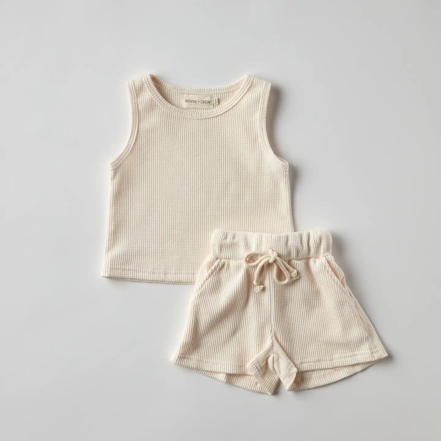 Madden Tank Set in cream featuring a waffle-knit tank and drawstring shorts for kids, ideal for summer comfort.