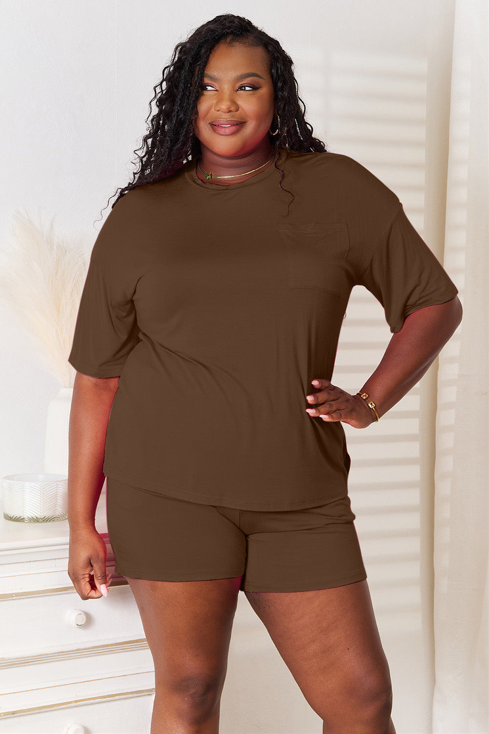 Model wearing brown Basic Bae soft rayon half-sleeve top and shorts set, showcasing relaxed everyday style.