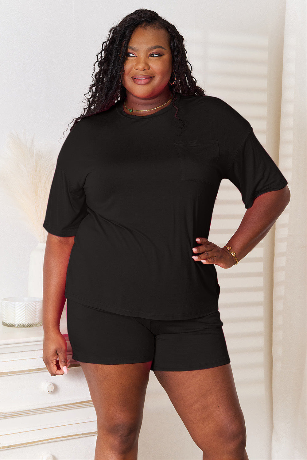 Basic Bae soft rayon half sleeve top and shorts set in black for effortless everyday comfort and style.