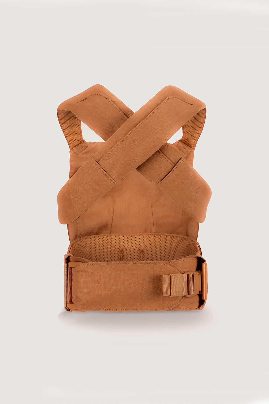 Willow Aerial Carrier in creamy caramel brown with matching straps and buckles, designed for comfort and style.