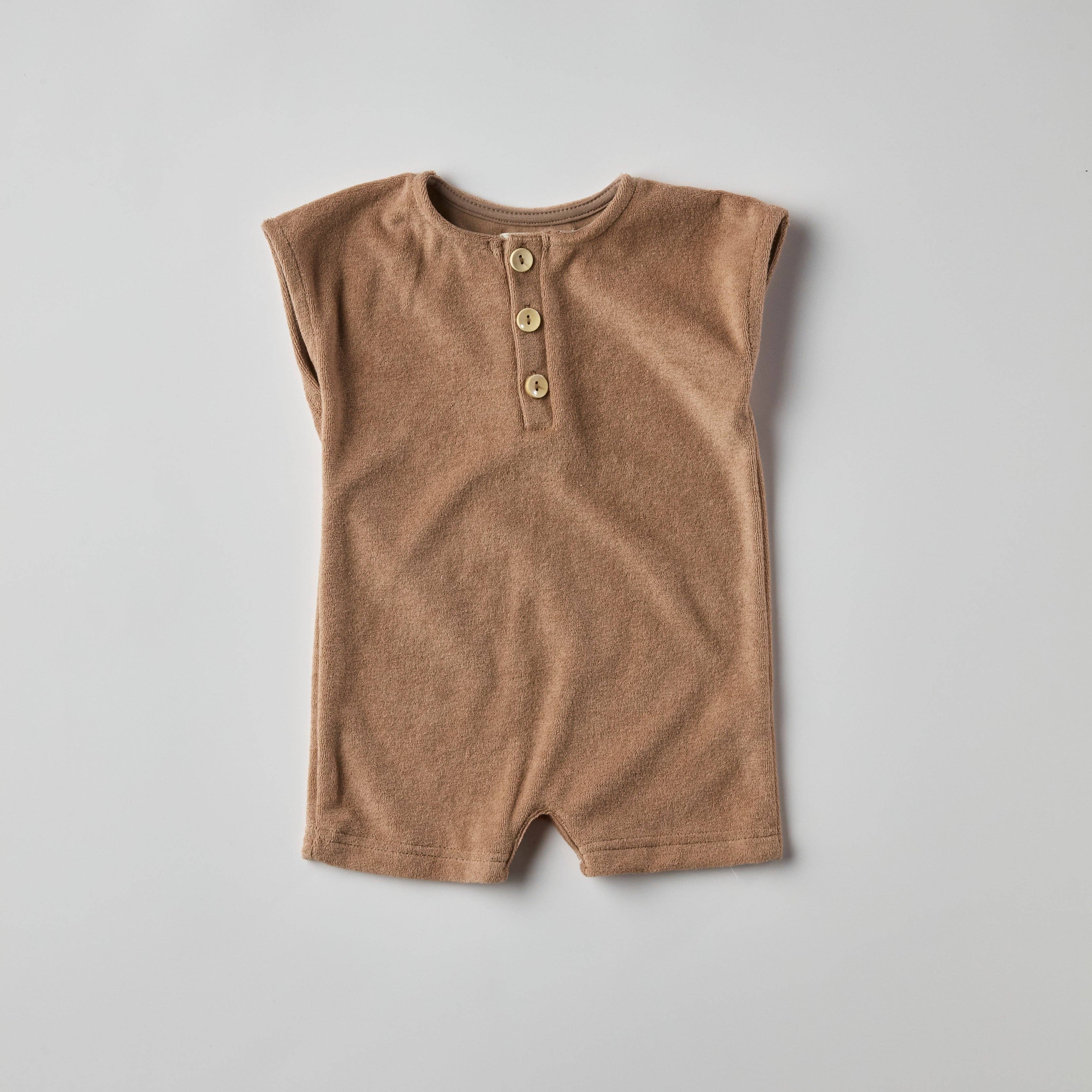 Dillon Romper in Brown, soft cotton one-piece for toddlers, perfect for play and warm days.