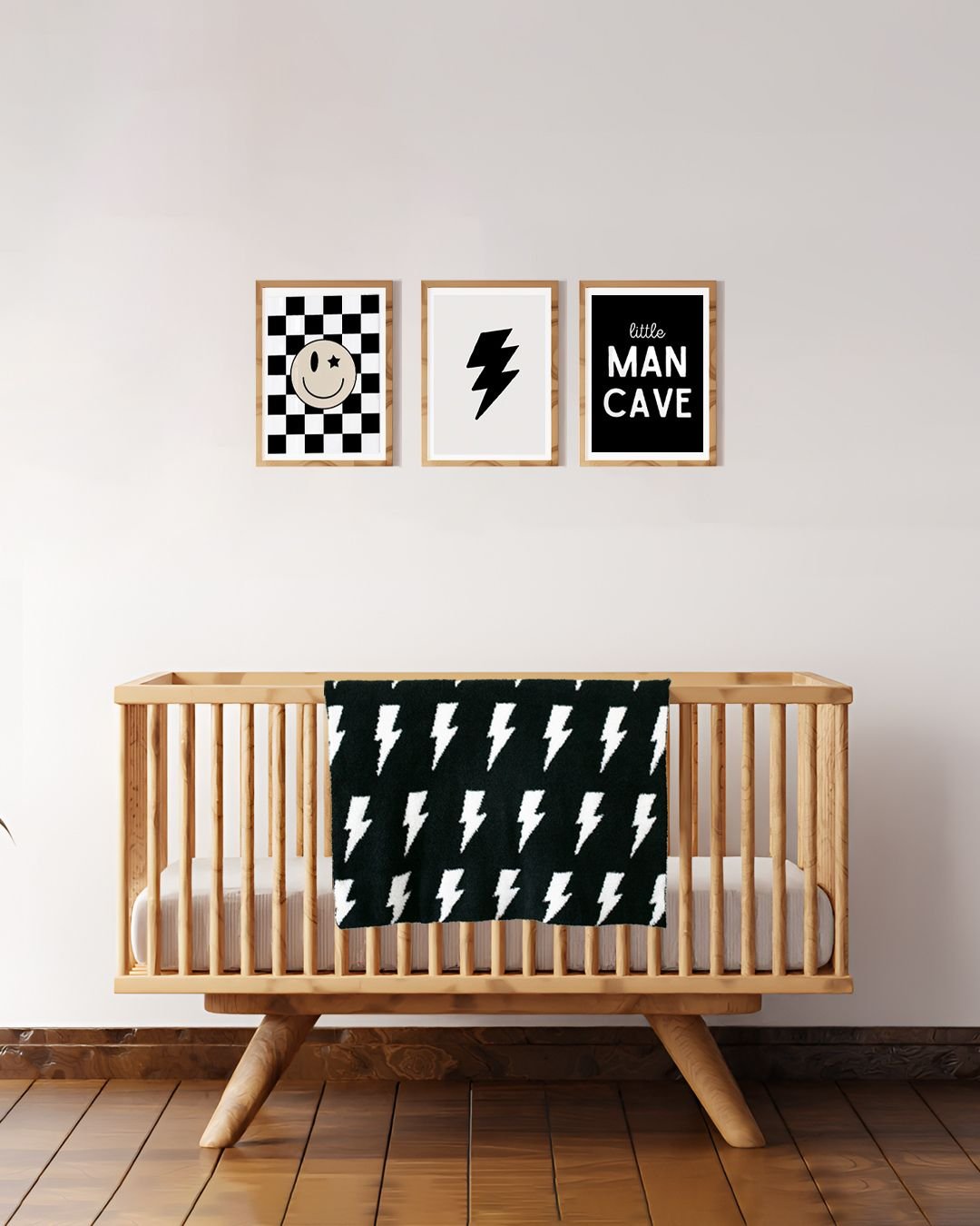 Lightning Bolt Fuzzy Blanket draped over a modern crib with playful wall art in a stylish nursery.