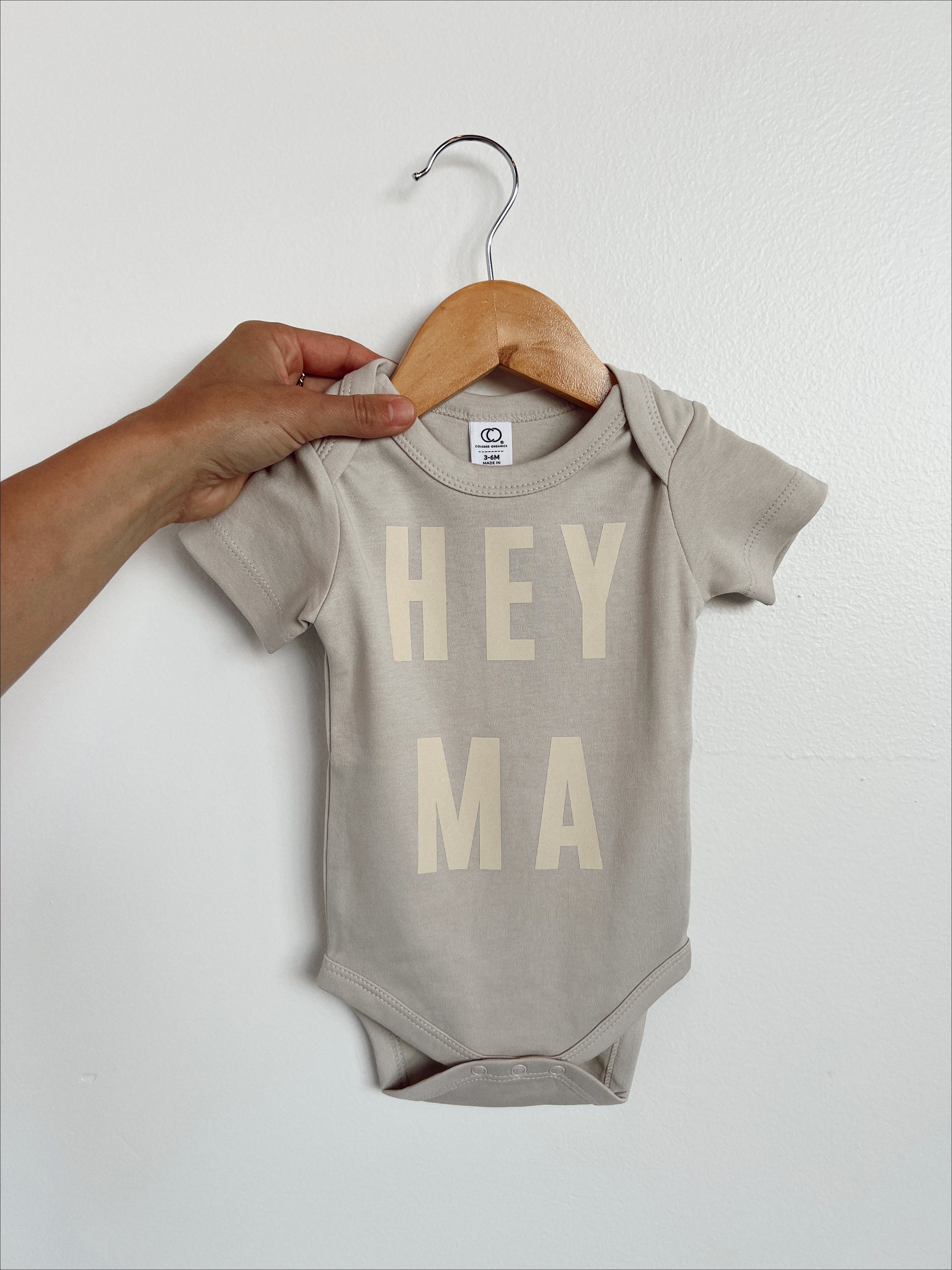 Hey Ma organic baby onesie in cream, ethically made from soft cotton for trendy and cool baby outfits.