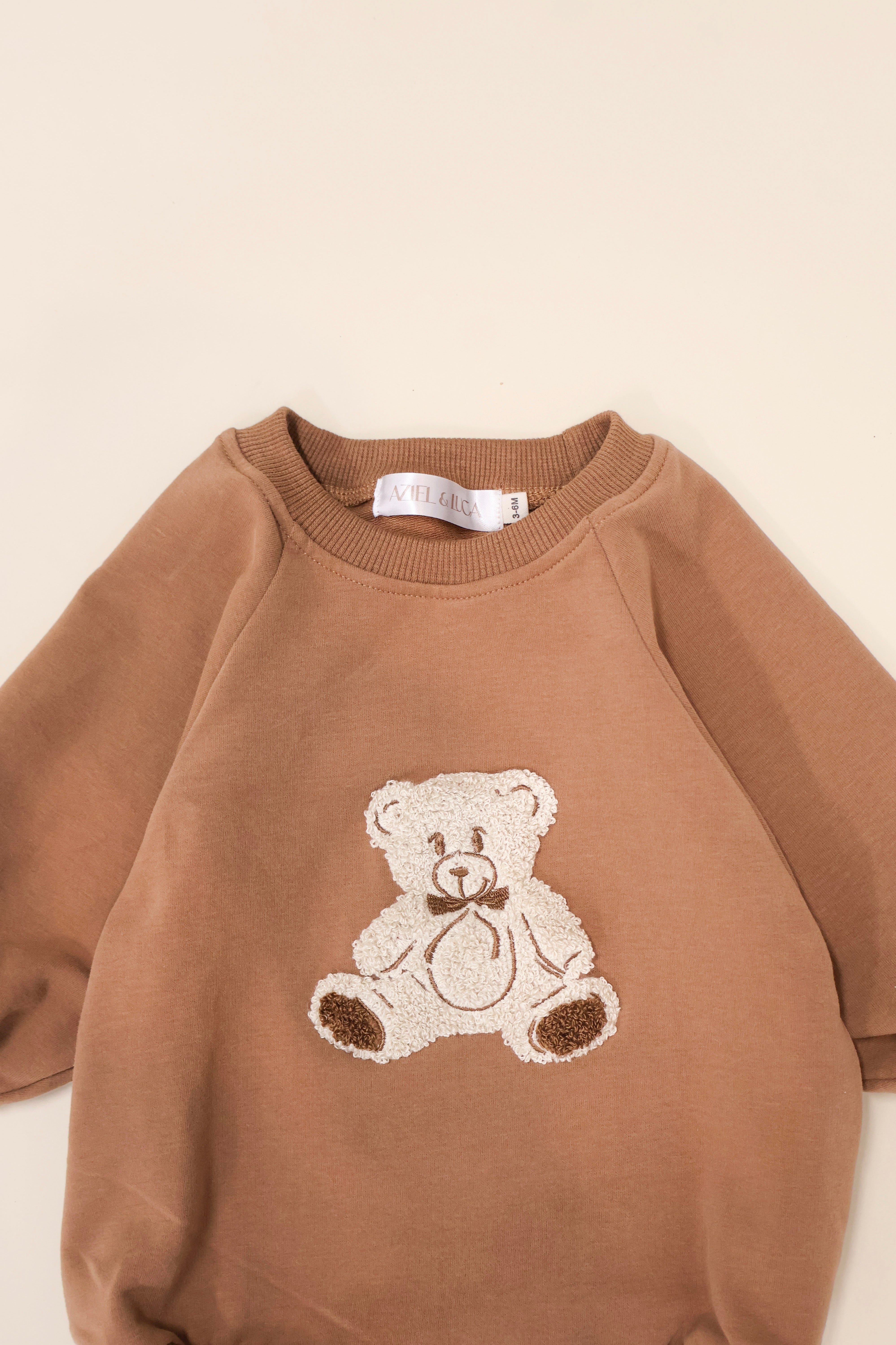 Lightweight Bear Bubble Romper with soft terry and adorable bear embroidery, perfect for comfort and play.