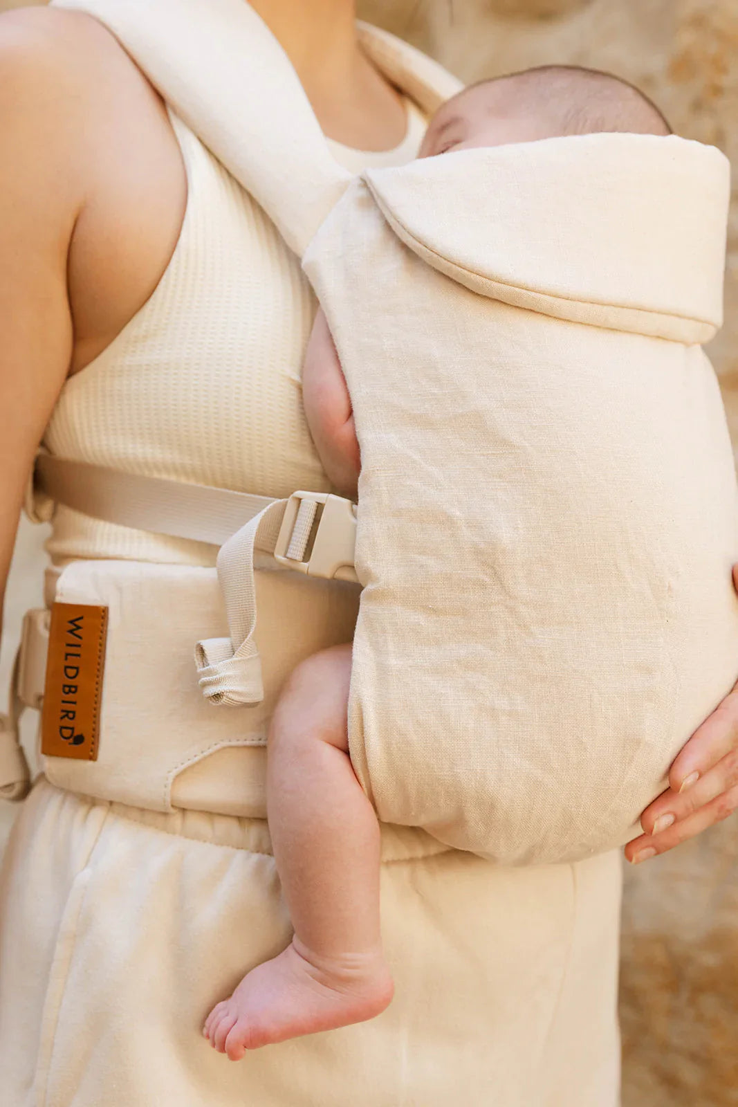 Sparrow Aerial Carrier in vanilla beige, featuring color-matched straps, mesh, and buckles, designed for comfort and style.