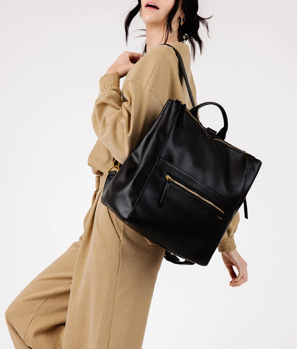 Square Diaper Bag Backpack in premium matte faux leather, worn stylishly as a backpack, ideal for busy parents.