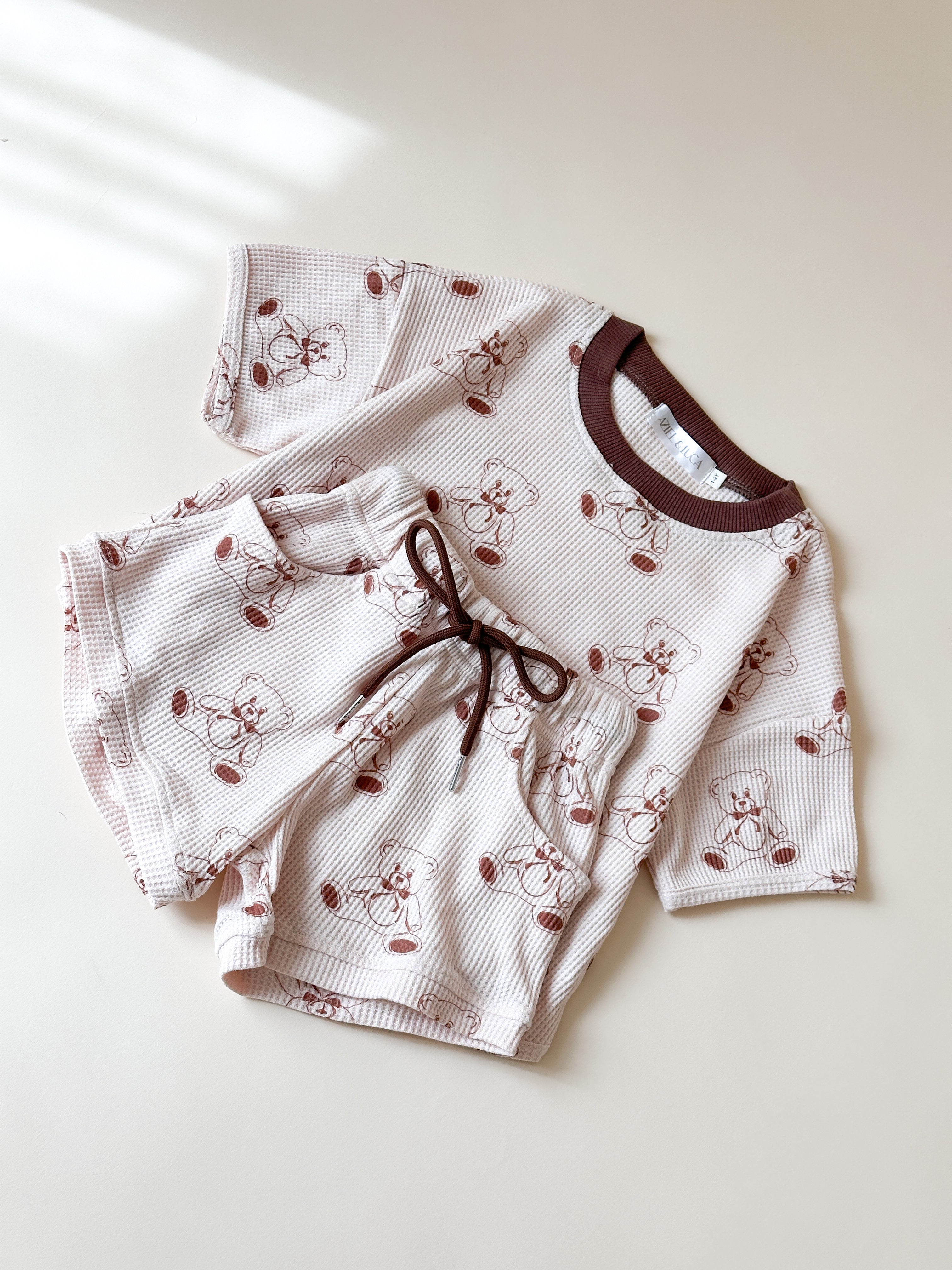 Adorable printed waffle set for babies featuring Bolt, Bow, Cherry, and Bear designs in soft, cozy material.