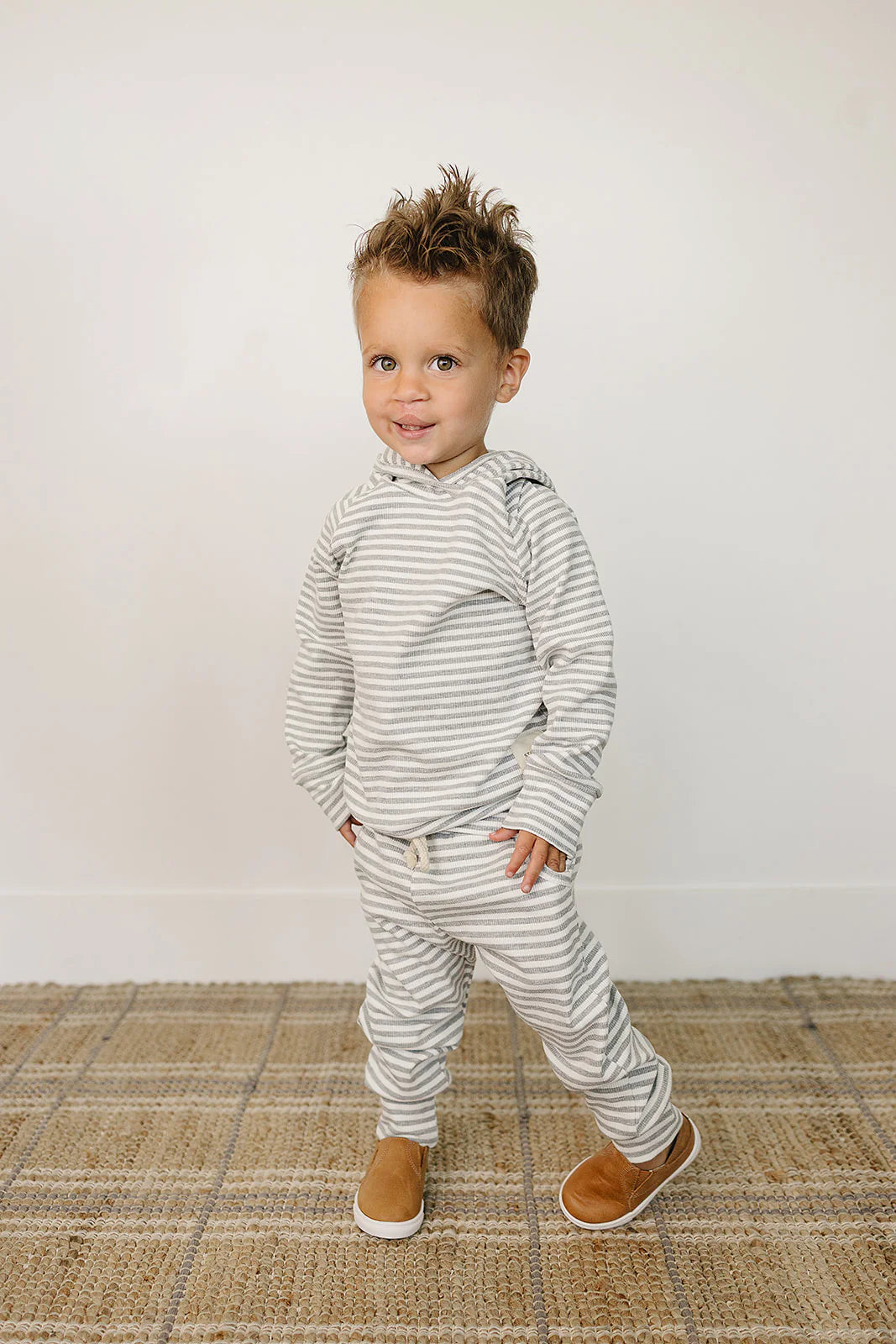 Grey Striped Baby and Toddler Lounge Set with Hoodie, perfect for lounging and play, featuring a soft hoodie top and matching pants.
