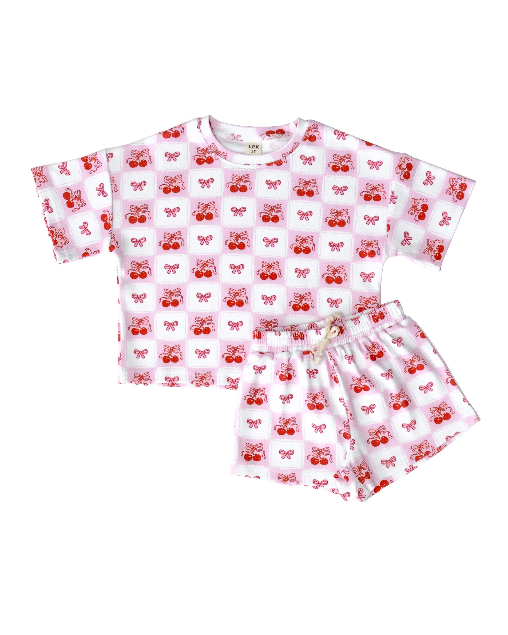 Checkered Cherry Shorts Set for kids with playful cherry motif and soft cotton blend fabric, perfect for summer.